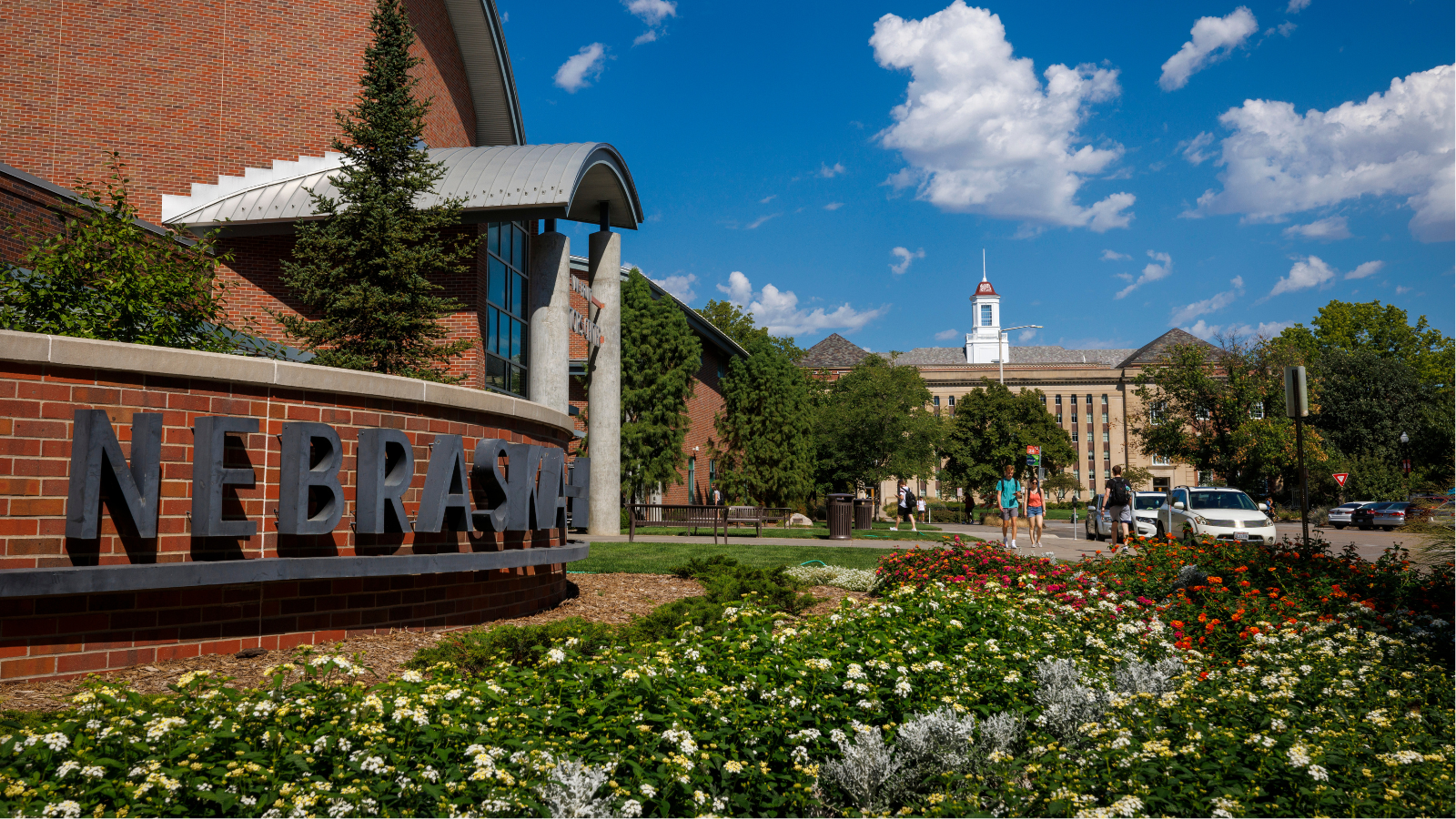 Nebraska text on sign infront of welcome center on UNL campus