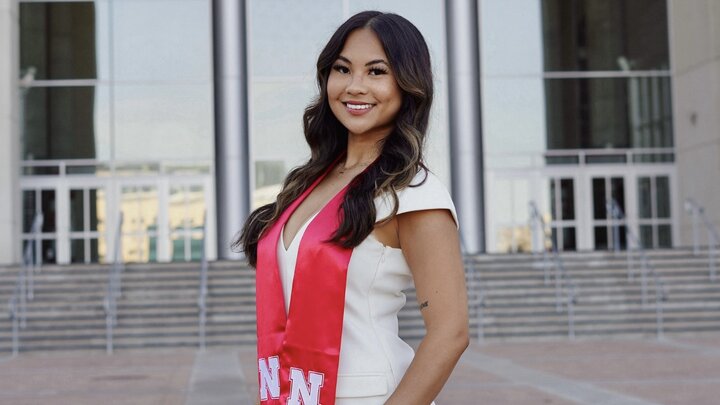 Erica smiling for graduation picture