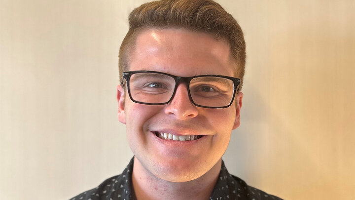 male white student wearing black glasses