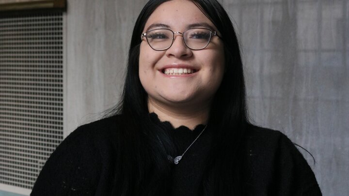 Idaly Del Rello smiling in headshot.