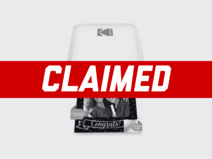 Photo printer with a 'claimed' banner over it