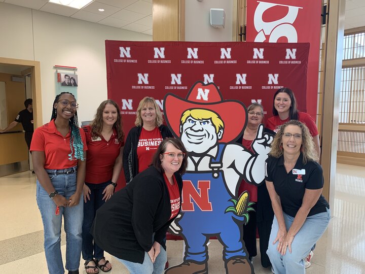 The college of business career team with Herbie Husker