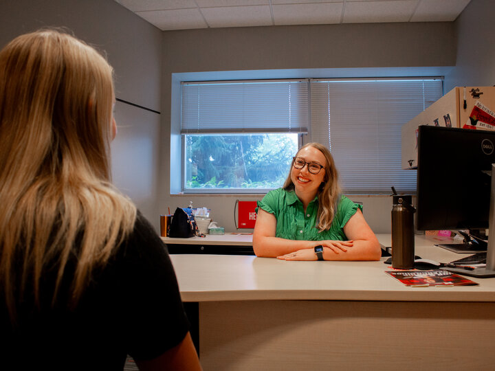 college of journalism and mass communication career coach meeting with a student